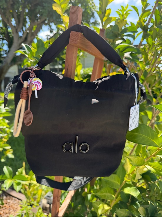 ALO Yoga Handbags - ALO Yoga Black Drawstring Mini Bucket Bag with Candy Charm